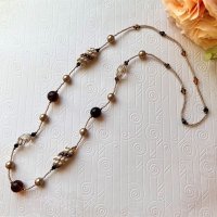 【再入荷！】マルチアフリカンヘリックスのロングネックレス(コニャック) by 磯部ひろみ