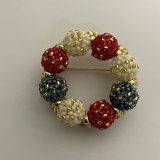 クリスマスリース (ブローチ)  by 梅村里美